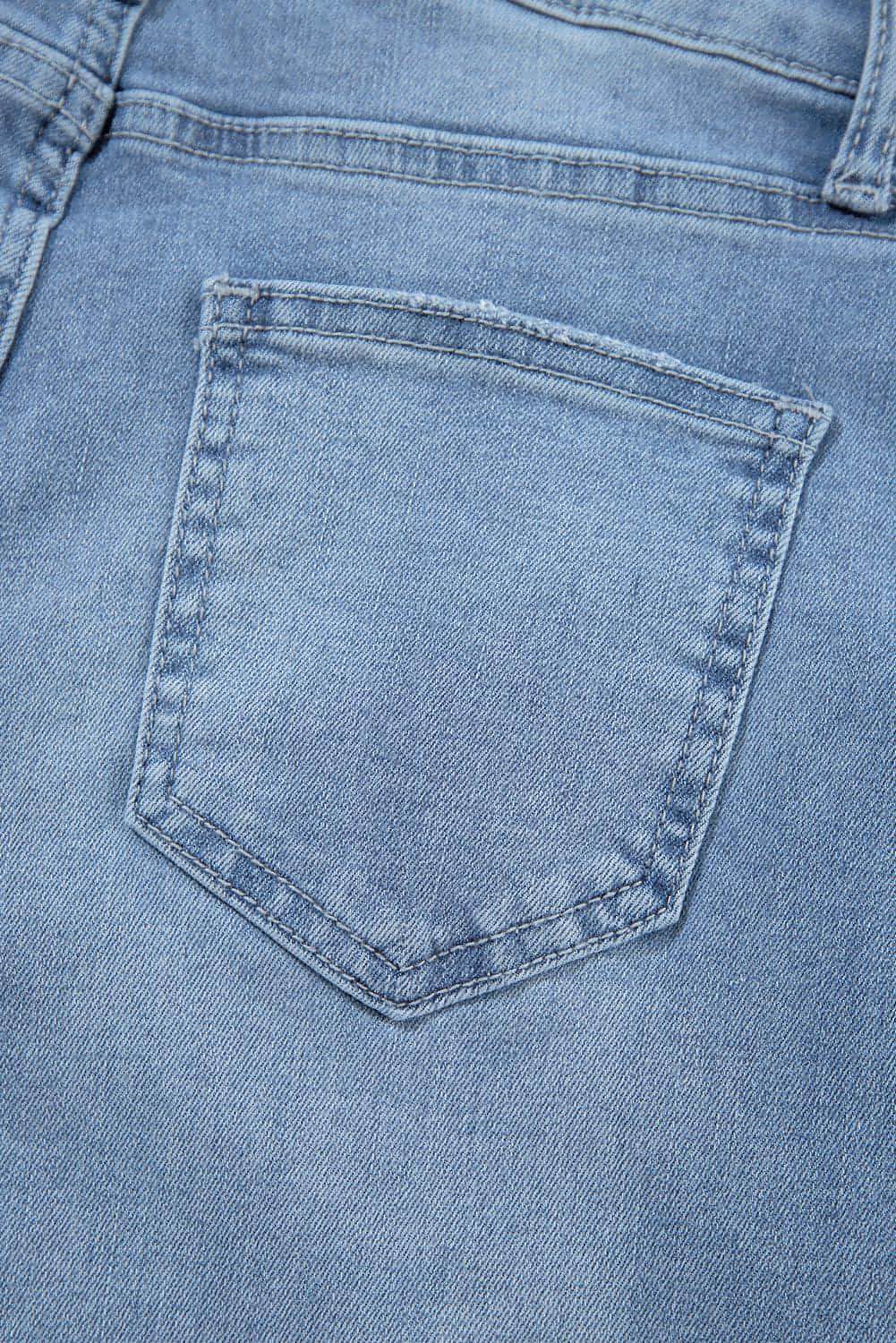 Dusk Blue High Rise Asymmetrisk Button Zip Fly Ripped Jeans