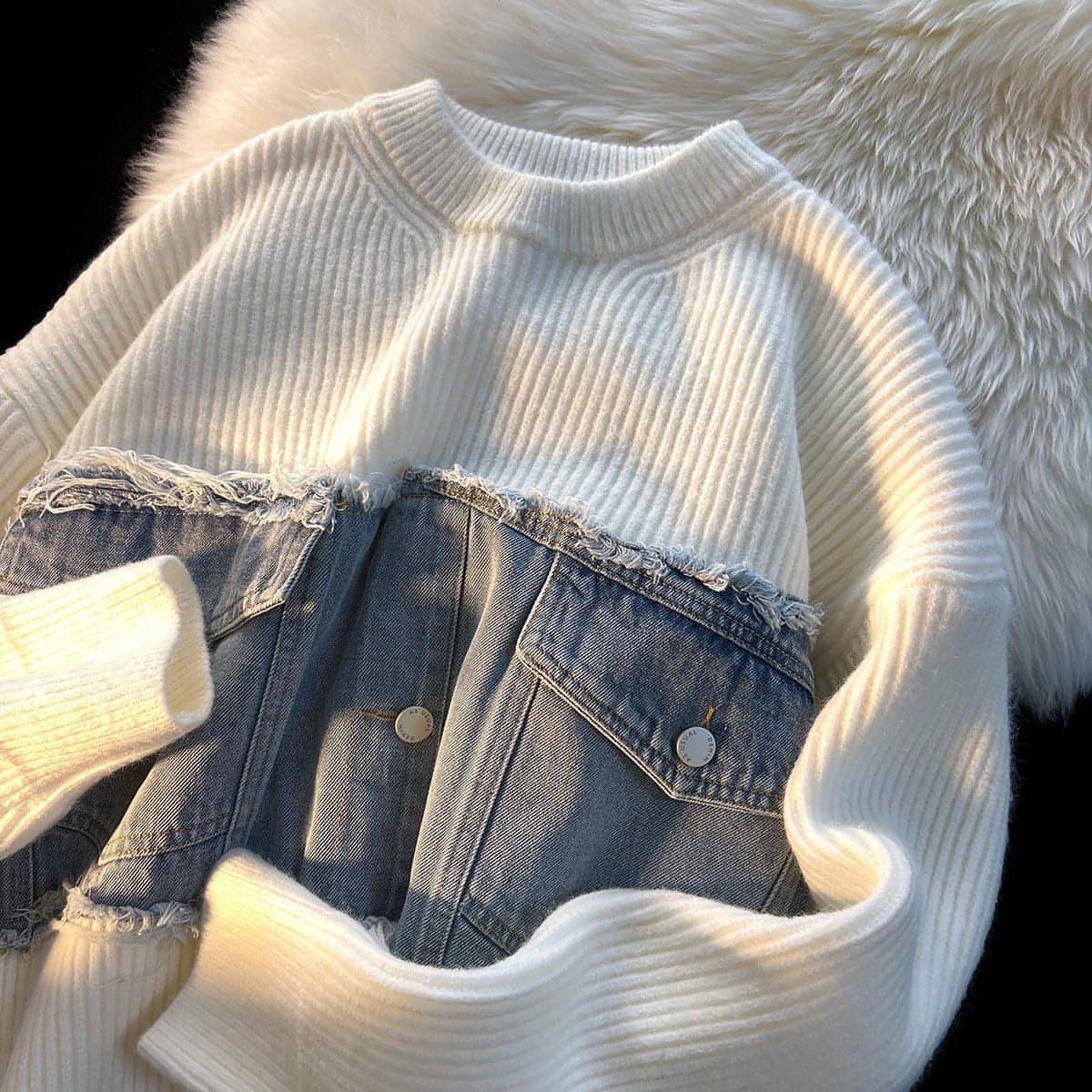 A. suéter de malhas de jeans de jeans