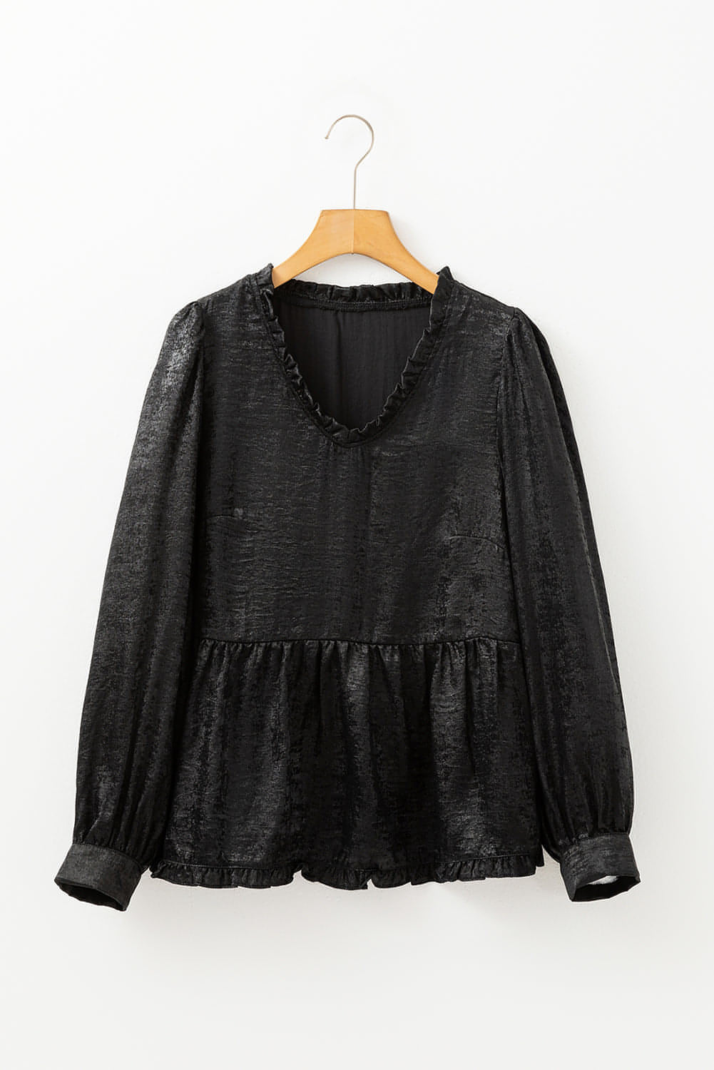 Blouse babydoll noire métallisée à volants et col en V à manches bouffantes