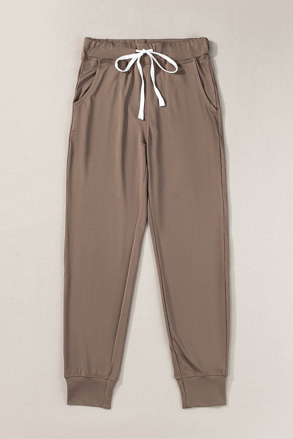 Pantalon de jogging marron foncé avec poches et cordon de serrage à la taille