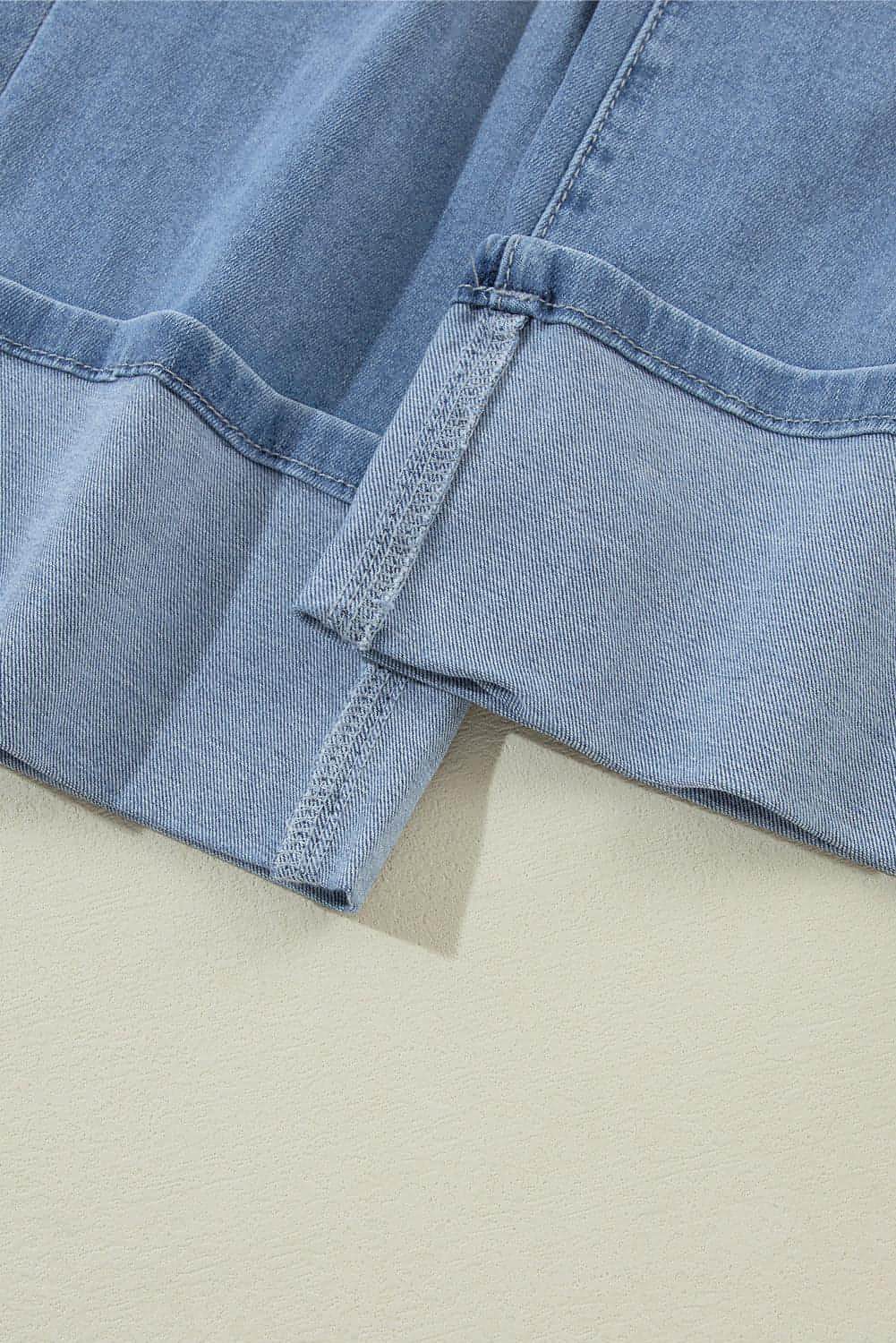 Dusk Blue High Rise Asymmetrisk Button Zip Fly Ripped Jeans
