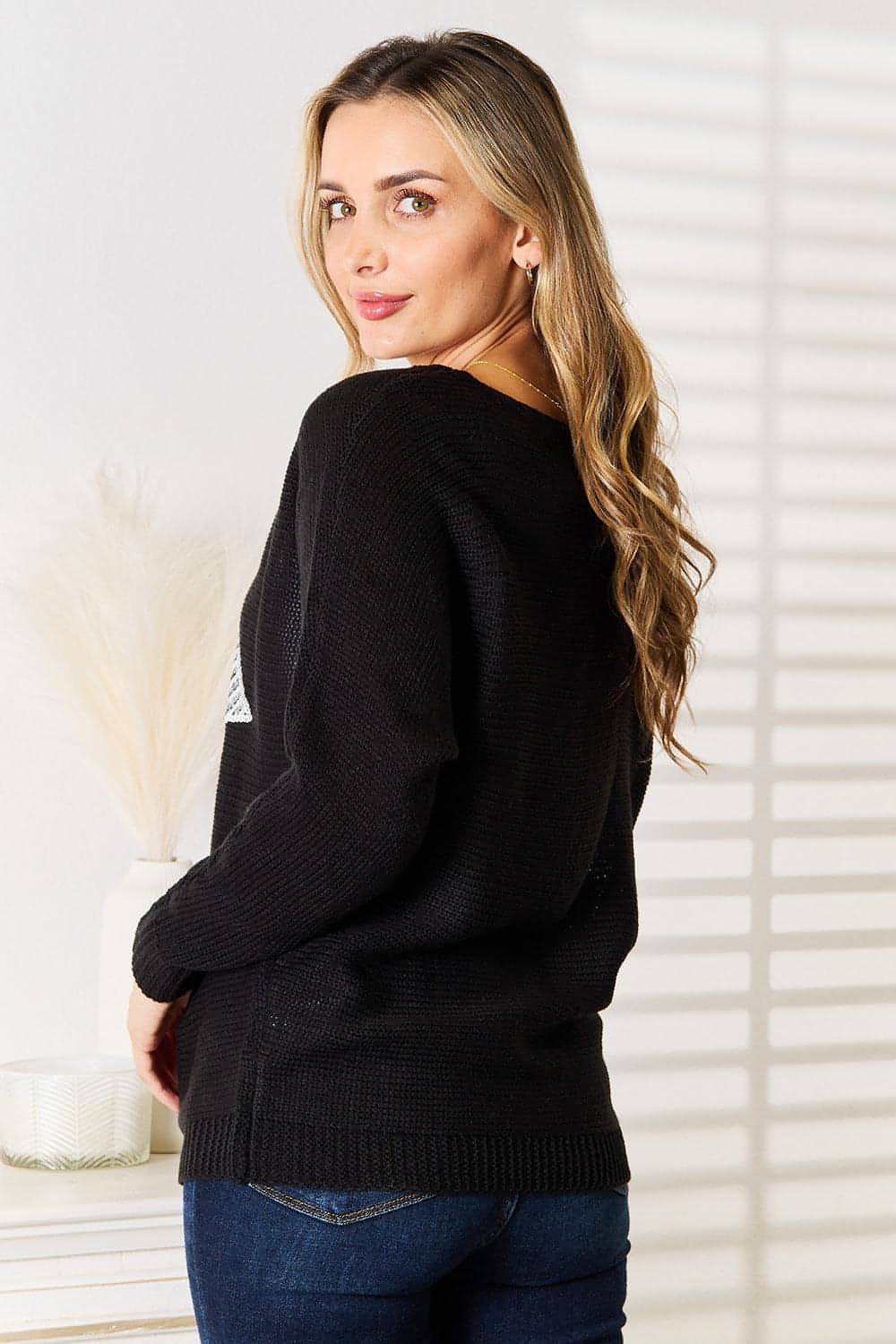 Blusa de punto con mangas dolman y estampado de lentejuelas