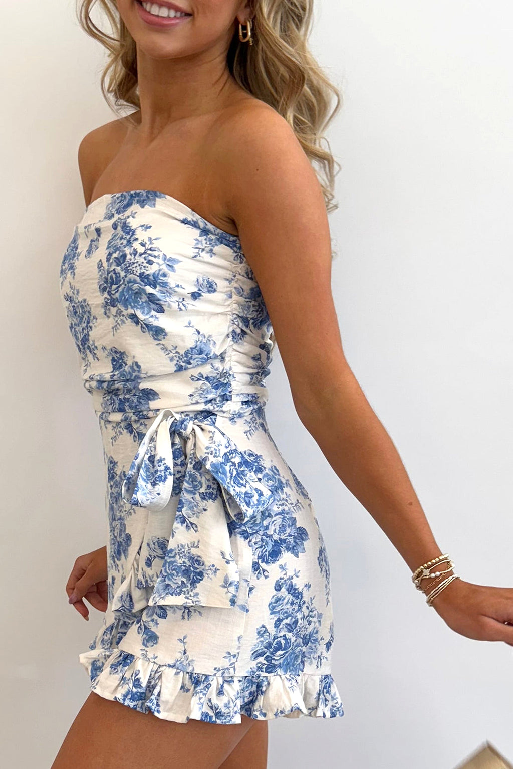 Sky Blue Floral Print Strapless Zipped Back Knot Waist Ruffled Romper - enhanced image 3