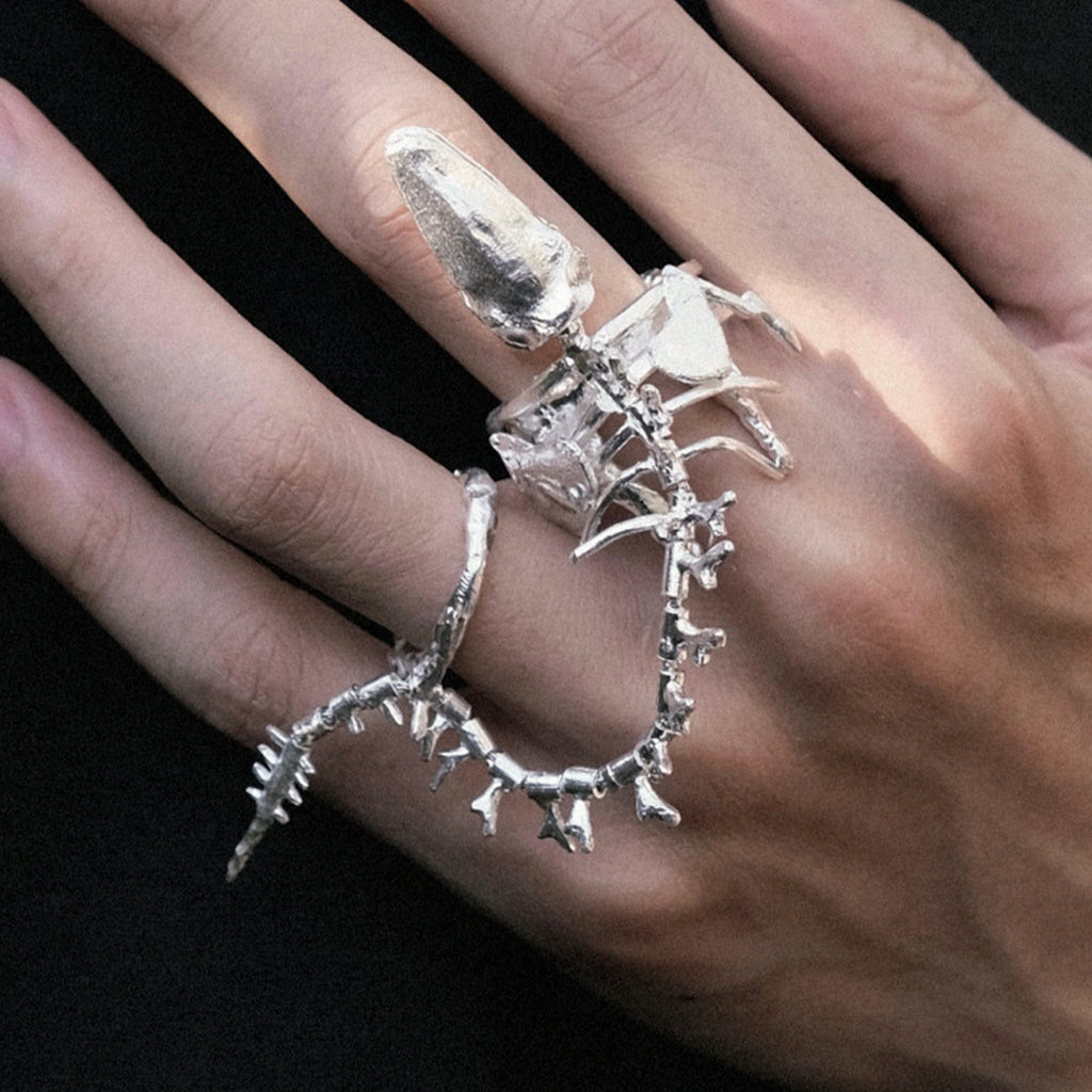 Women Wear White And Dark Bone Ring - enhanced image 3
