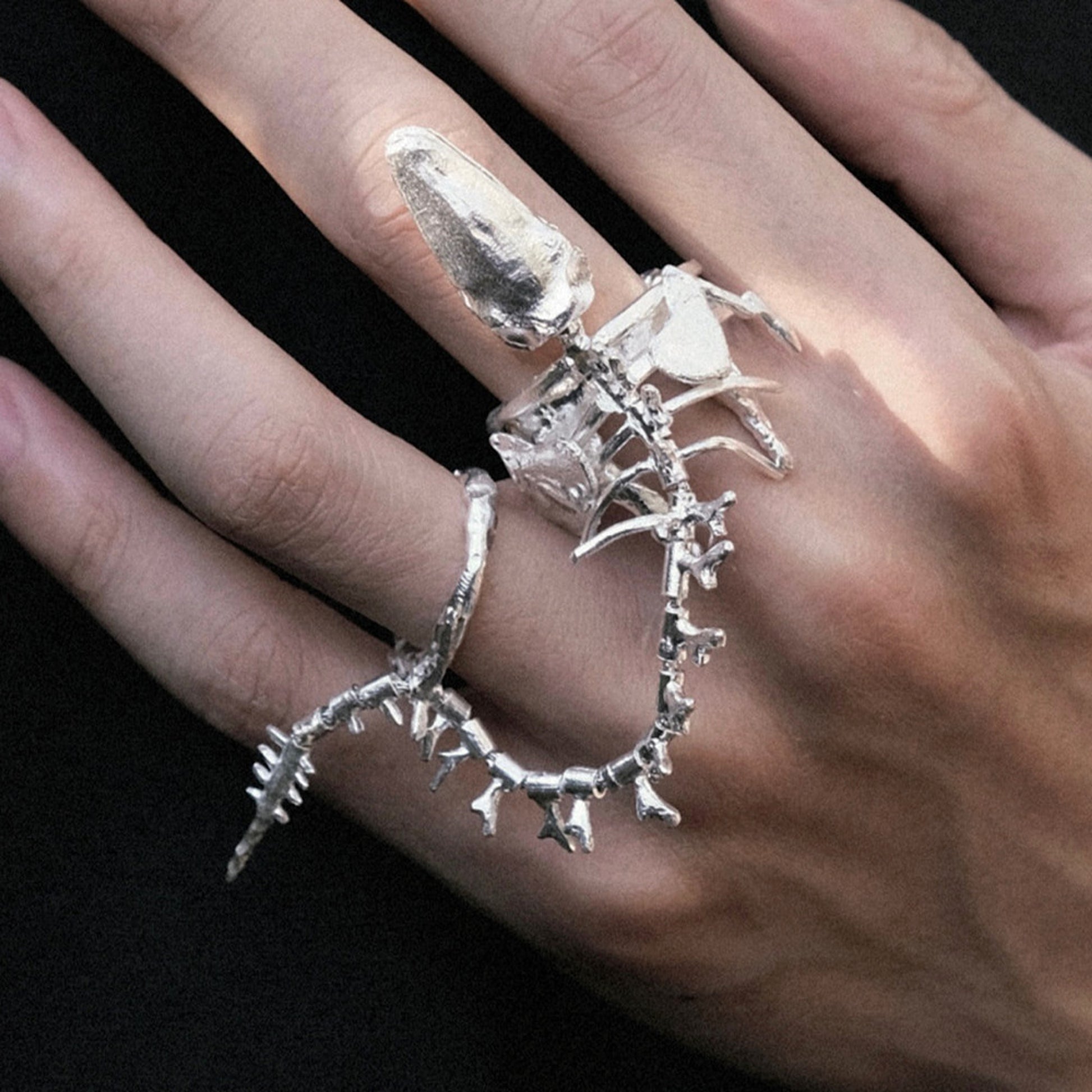 Women Wear White And Dark Bone Ring - enhanced image 3