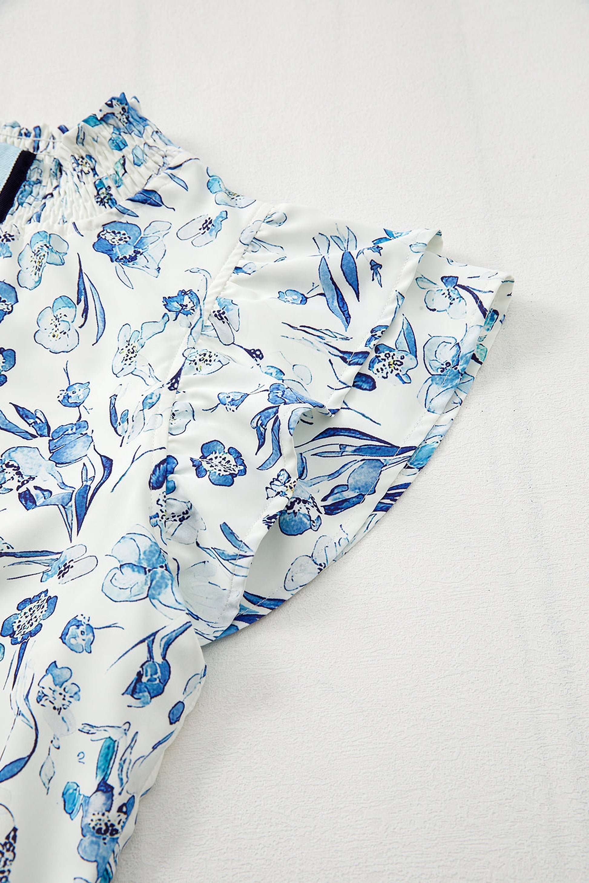 Sky Blue Floral Print Ruffled Short Sleeve Blouse - enhanced image 9