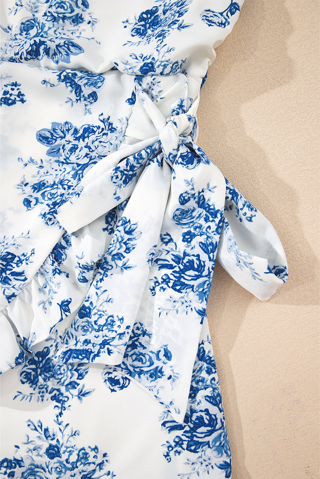 Sky Blue Floral Print Strapless Zipped Back Knot Waist Ruffled Romper - enhanced image 9