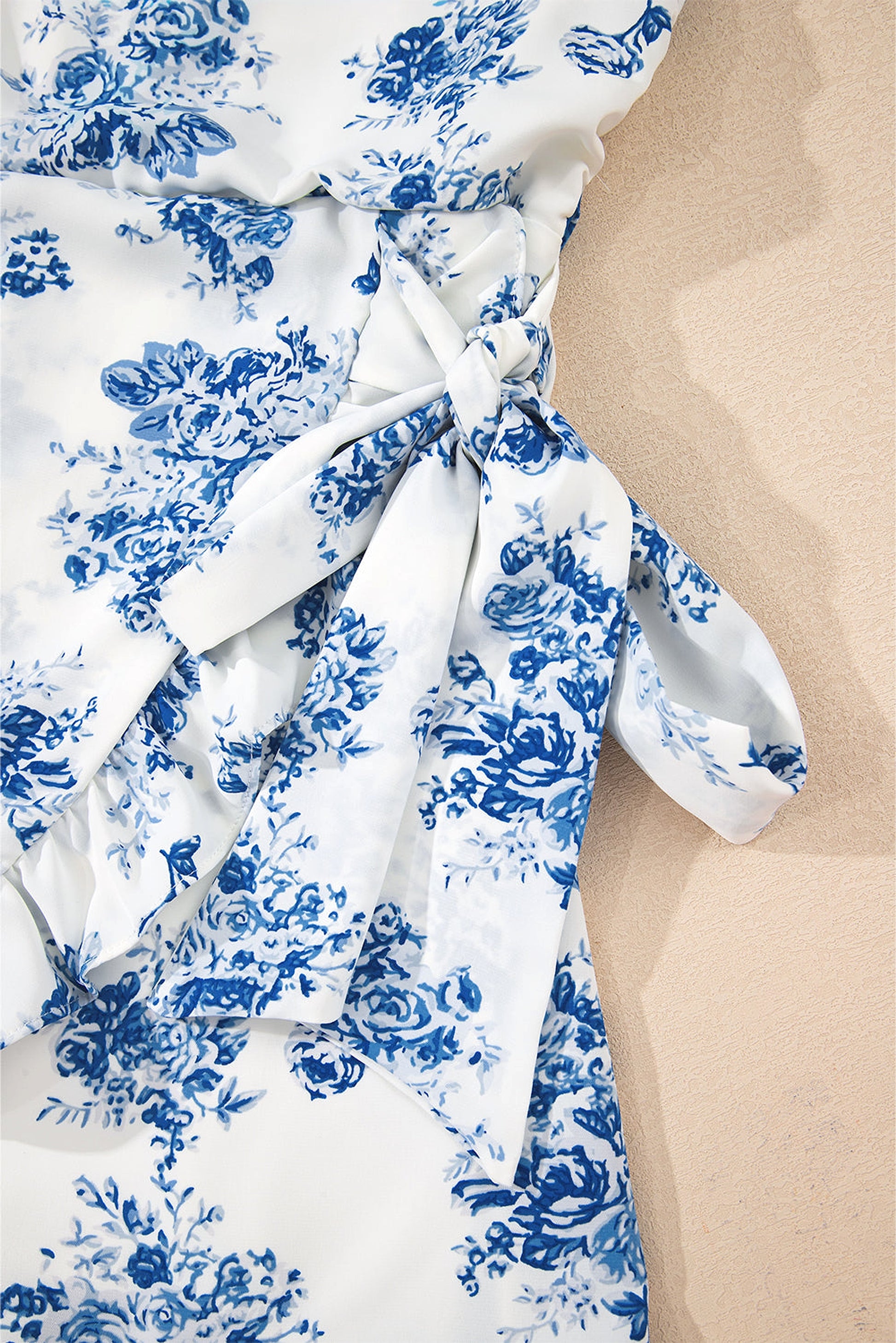 Sky Blue Floral Print Strapless Zipped Back Knot Waist Ruffled Romper - enhanced image 9