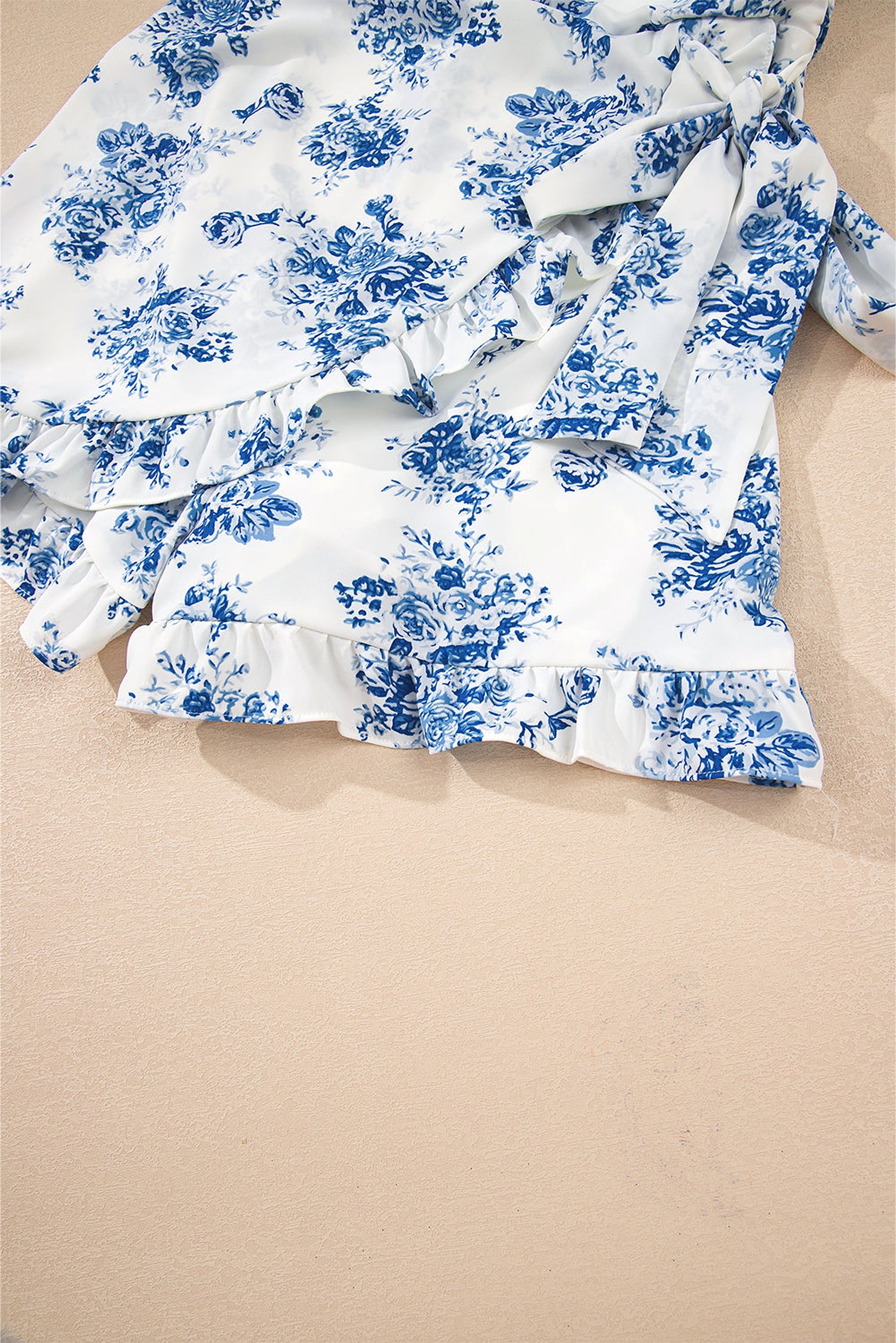 Sky Blue Floral Print Strapless Zipped Back Knot Waist Ruffled Romper - enhanced image 10